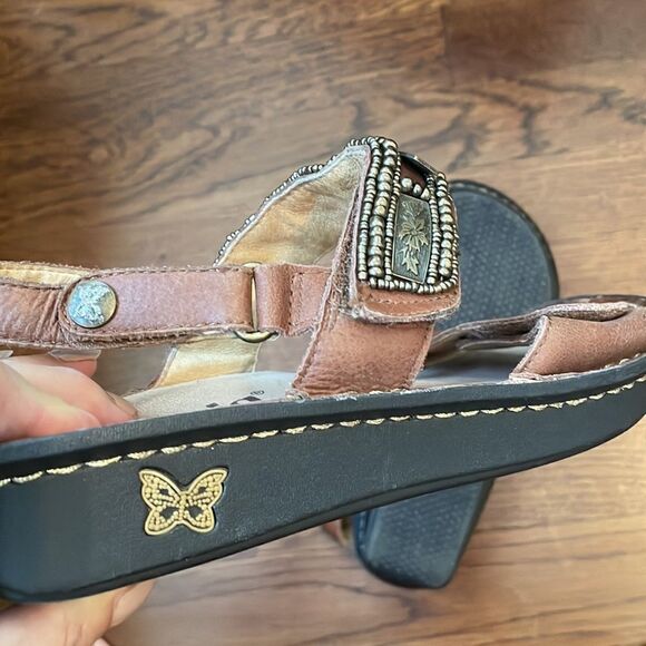 Alegria
by PG Lite brown leather Velcro strap sandals with bronze details on top - Picture 5 of 9